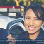Female police officer smiling - social media example
